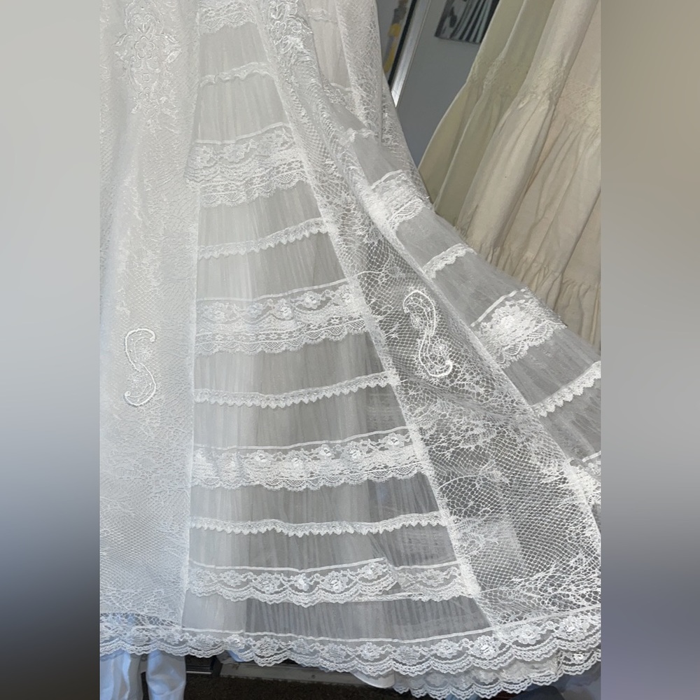 NWT designer wedding dress. Bought from “The White Dress” size 10 never altered - Picture 12 of 16